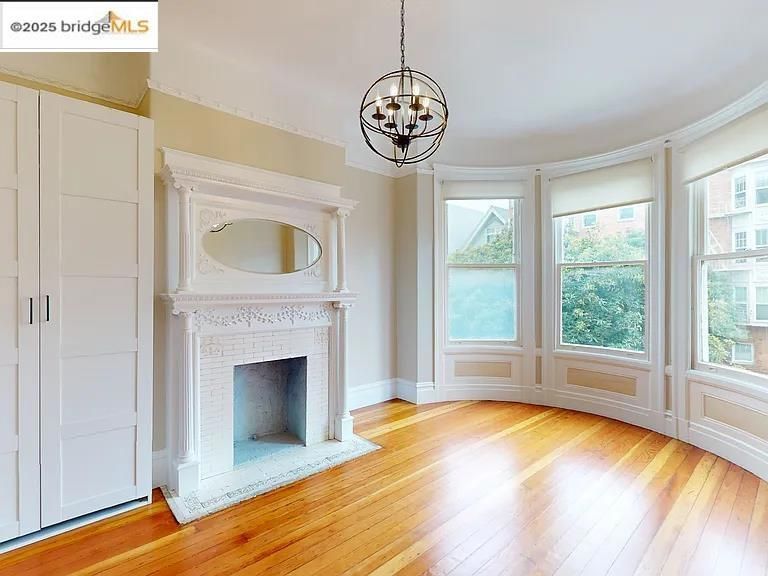 Empty room, Fireplace, Interior, Pendant Lights, Wood Texture Flooring
