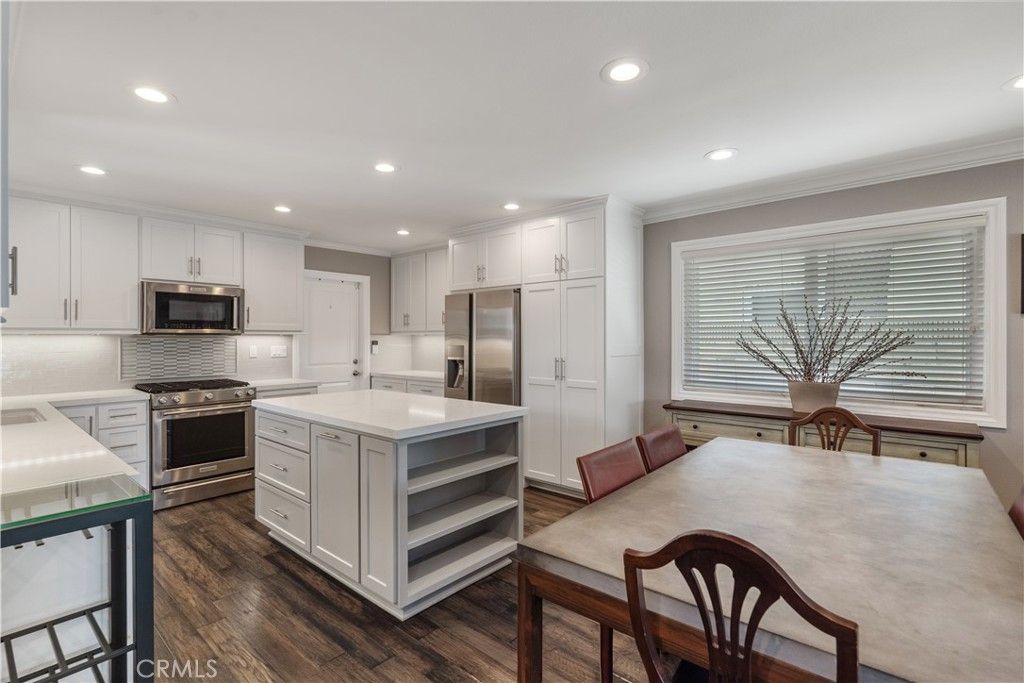 Dining room, Interior, Kitchen, Recessed Lighting, Stainless Steel Appliances, Wood Texture Flooring