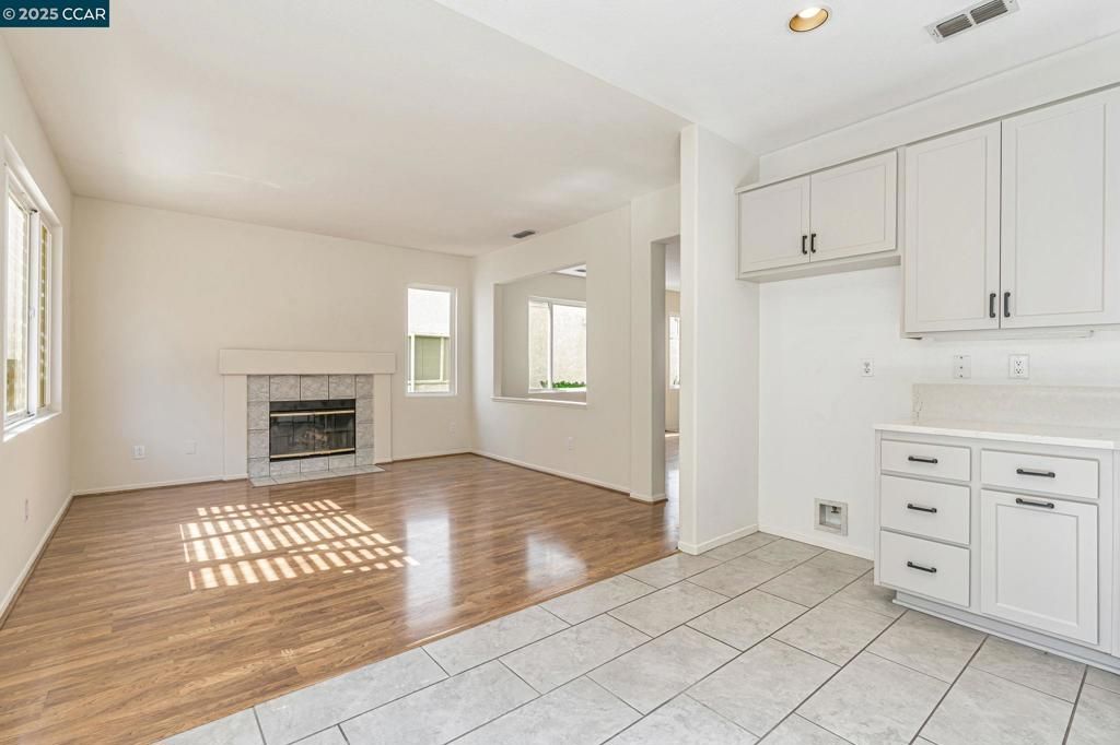 Empty room, Fireplace, Interior, Recessed Lighting, Wood Texture Flooring