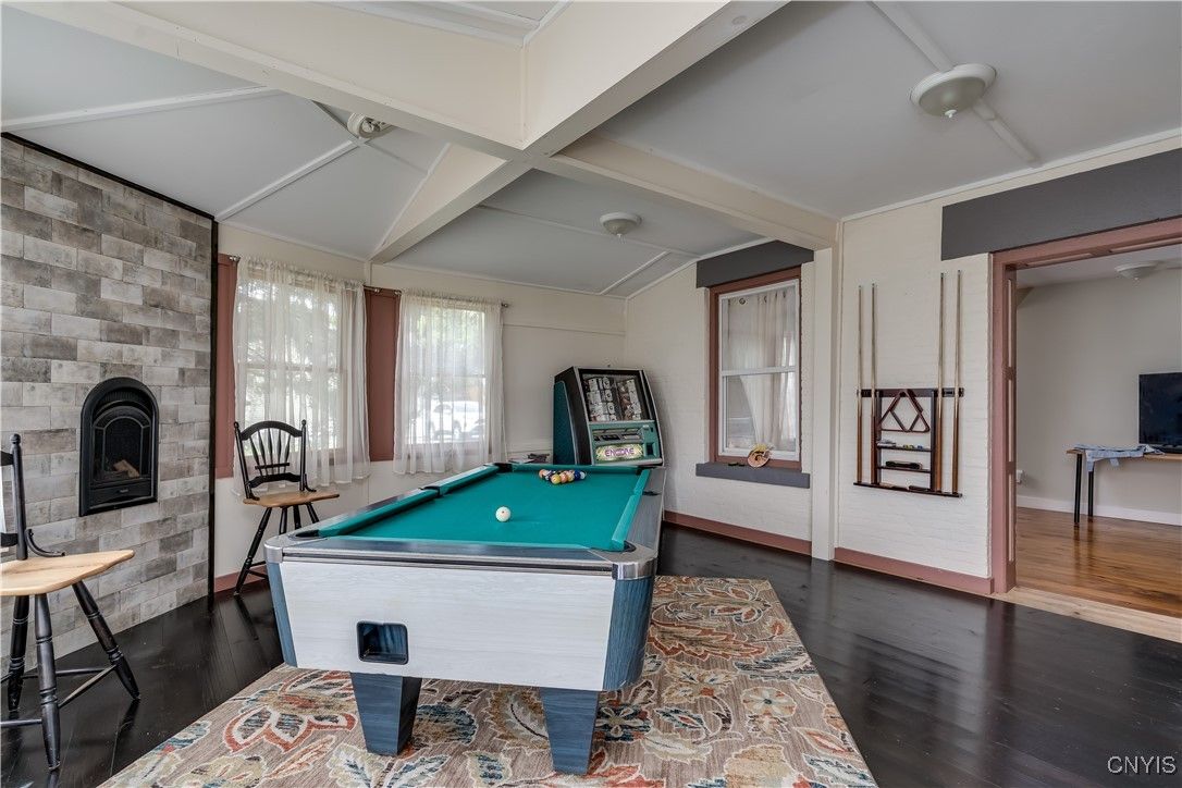 Billiard Table, Fireplace, Game Room, Interior, Stone Walls, Wood Texture Flooring