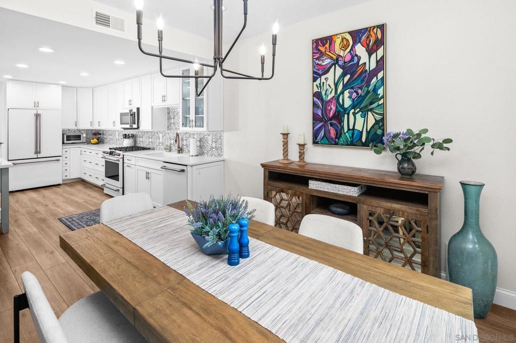 Dining room, Interior, Kitchen, Pendant Lights, Recessed Lighting, Stainless Steel Appliances, Wood Texture Flooring