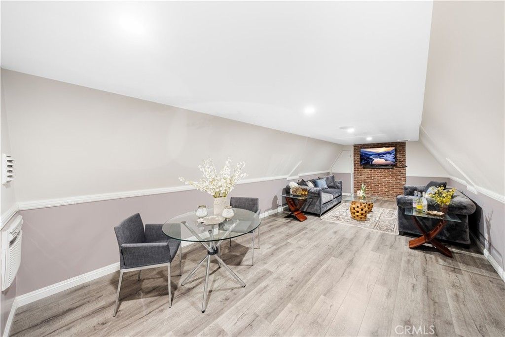 Dining room, Interior, Living room, Recessed Lighting, Stone Walls, Wood Texture Flooring