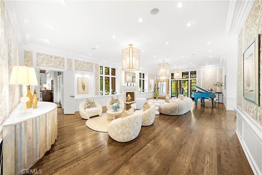 Billiard Table, Fireplace, Game Room, Interior, Living room, Pendant Lights, Recessed Lighting, Wood Texture Flooring