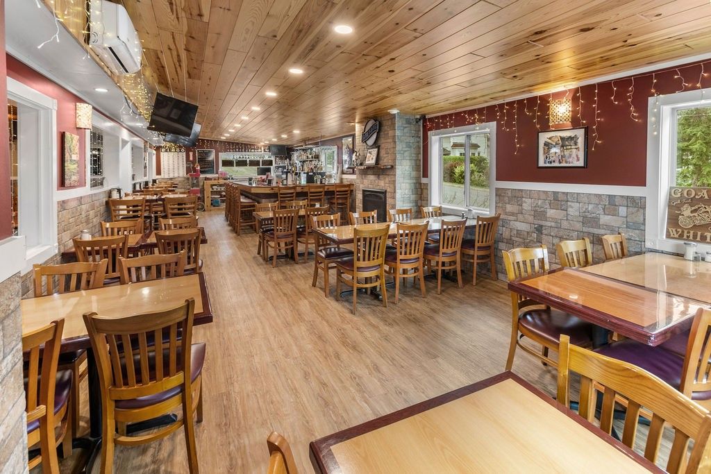 Dining room, Fireplace, Interior, Recessed Lighting, Stone Walls, Wooden Ceilings, Wood Texture Flooring