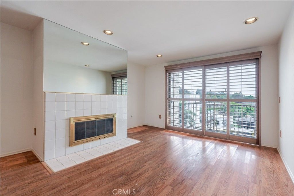 Empty room, Fireplace, Interior, Recessed Lighting, Wood Texture Flooring
