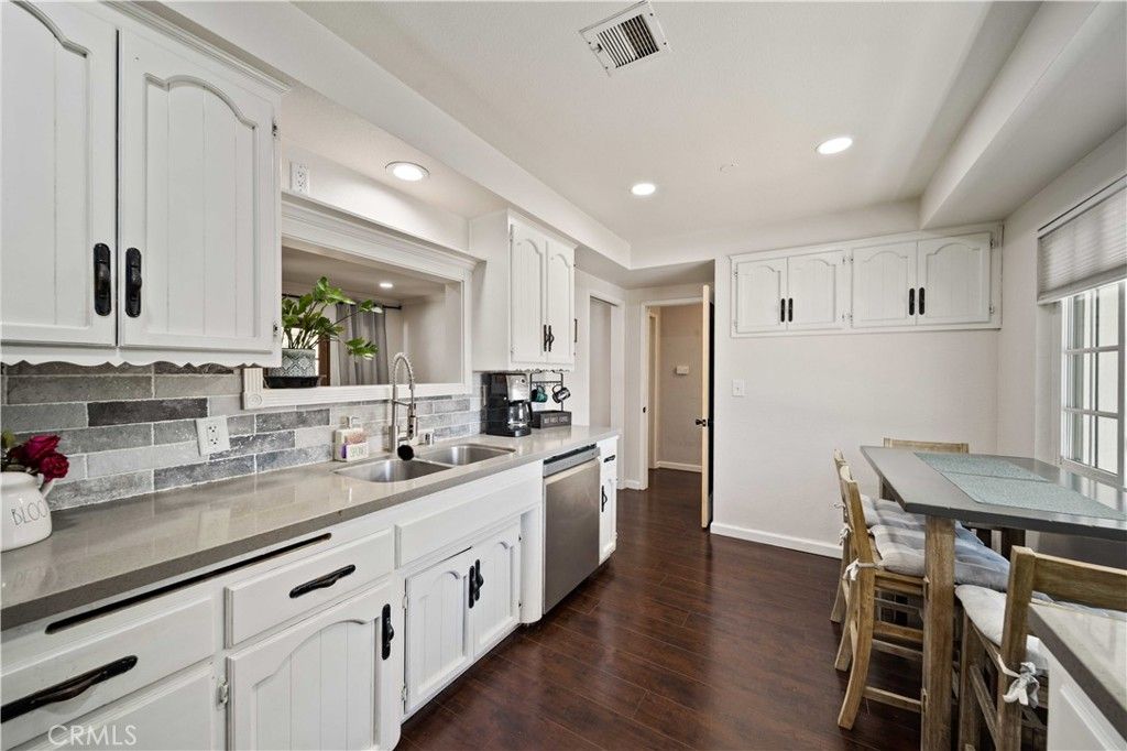 Dining room, Interior, Kitchen, Recessed Lighting, Stainless Steel Appliances, Wood Texture Flooring