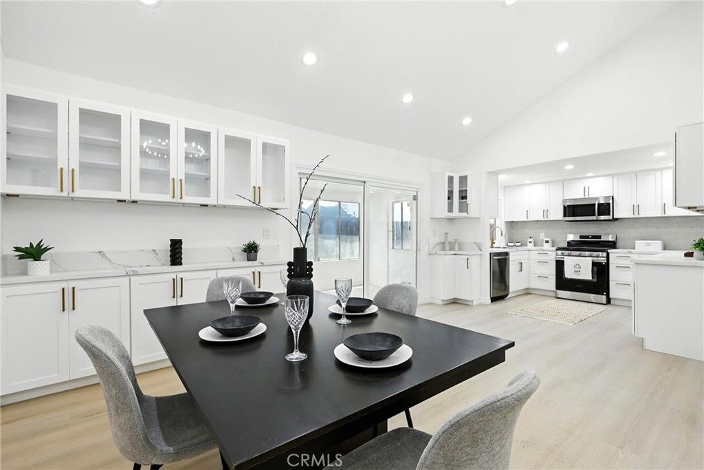 Dining room, Interior, Kitchen, Recessed Lighting, Stainless Steel Appliances, Wood Texture Flooring