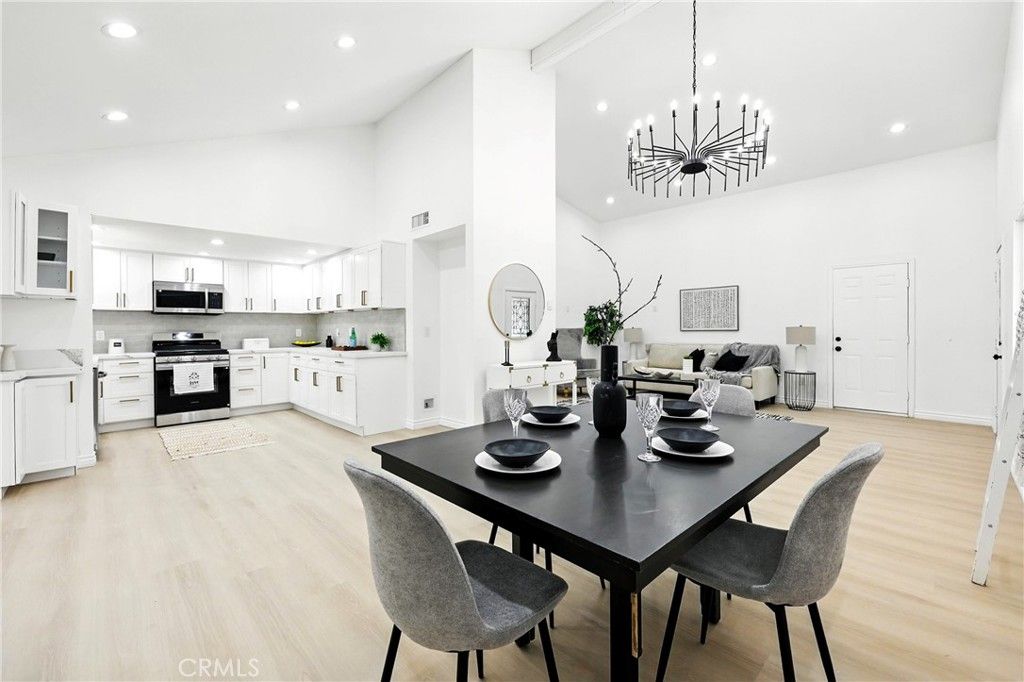 Dining room, Interior, Kitchen, Living room, Pendant Lights, Recessed Lighting, Stainless Steel Appliances, Wood Texture Flooring
