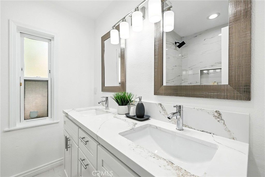 Bathroom, Dual Sink Vanities, Interior, Marble, Marble Walls, Recessed Lighting