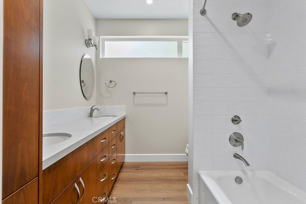 Bathroom, Dual Sink Vanities, Interior, Recessed Lighting, Wood Texture Flooring