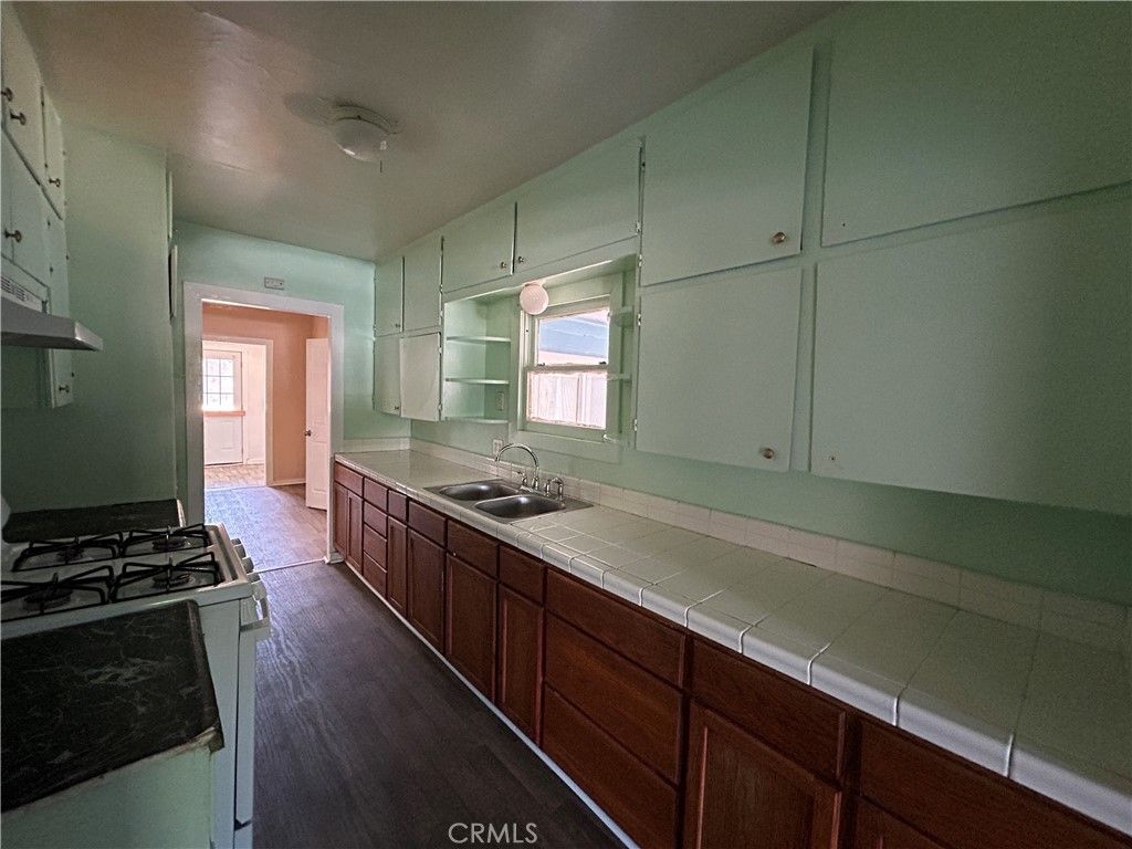 Interior, Kitchen, Tile Countertops, Wood Texture Flooring