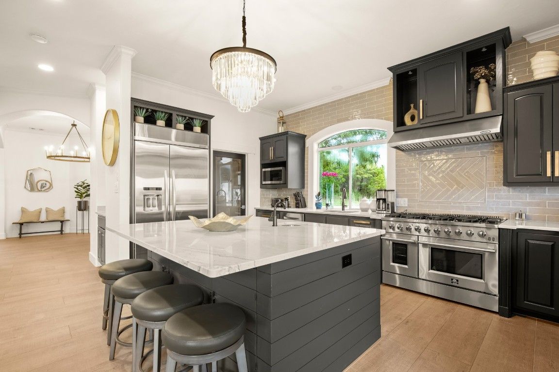 Chandelier, Interior, Kitchen, Pendant Lights, Recessed Lighting, Stainless Steel Appliances, Wood Texture Flooring