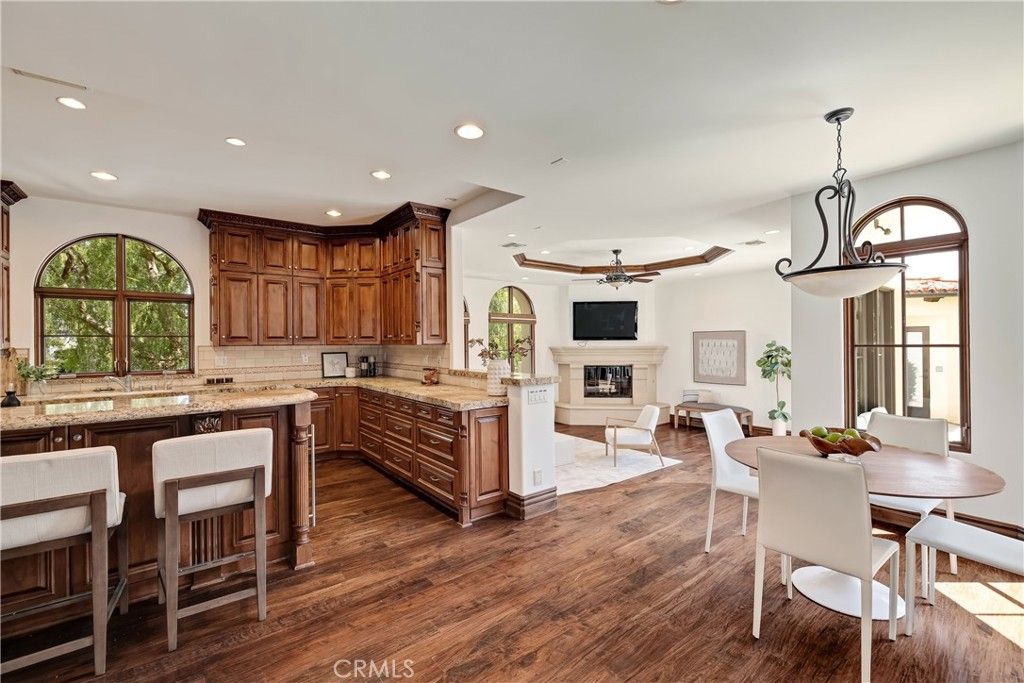 Dining room, Fireplace, Interior, Kitchen, Pendant Lights, Recessed Lighting, Wood Texture Flooring