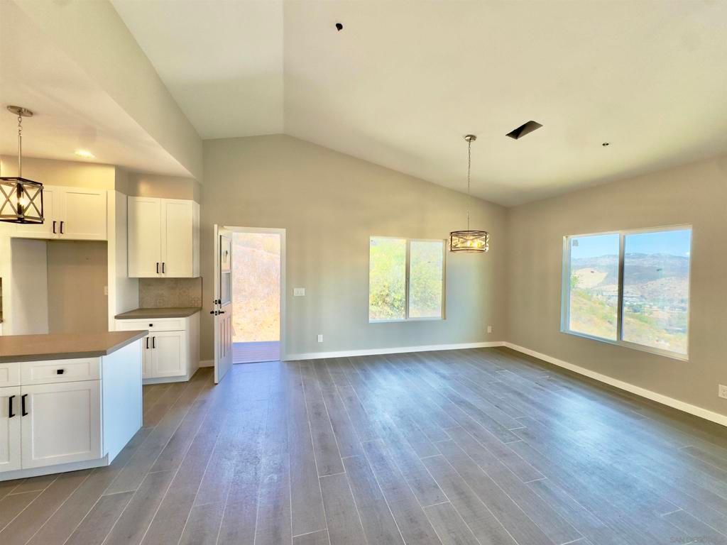 Empty room, Interior, Kitchen, Pendant Lights, Recessed Lighting, Wood Texture Flooring