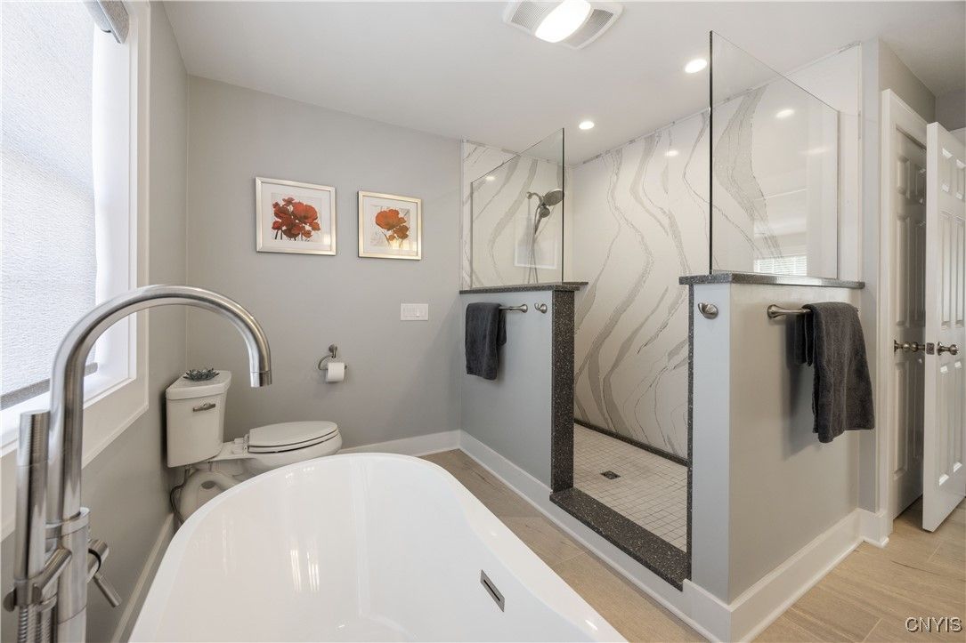 Bathroom, Free Standing Baths, Glass Shower, Interior, Marble Walls, Recessed Lighting
