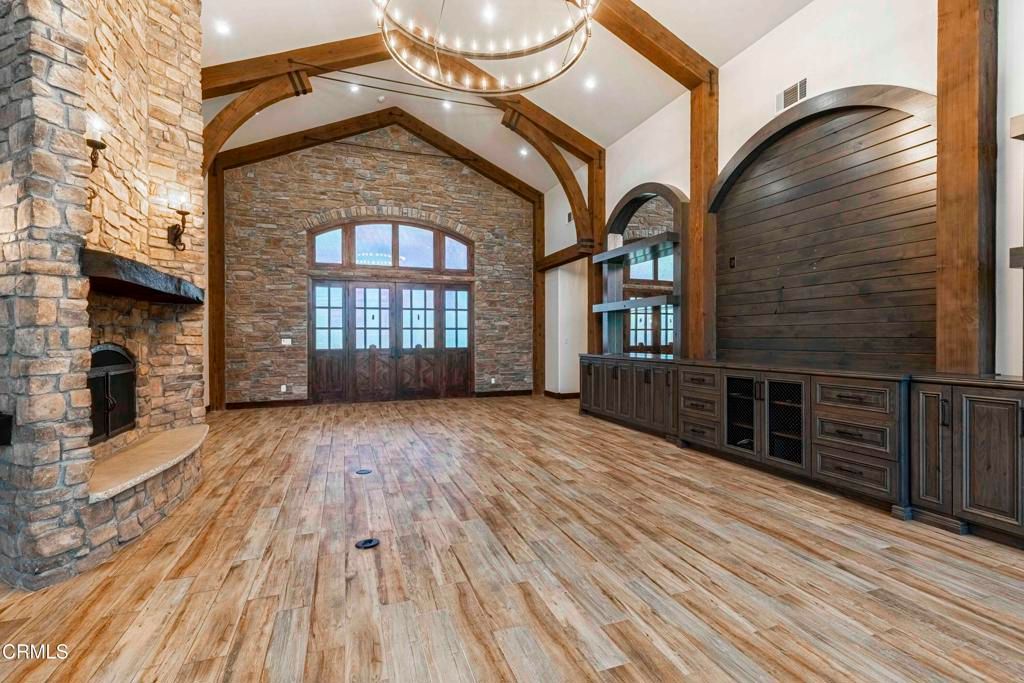 Fireplace, Interior, Pendant Lights, Recessed Lighting, Stone Walls, Wooden Beams, Wood Texture Flooring