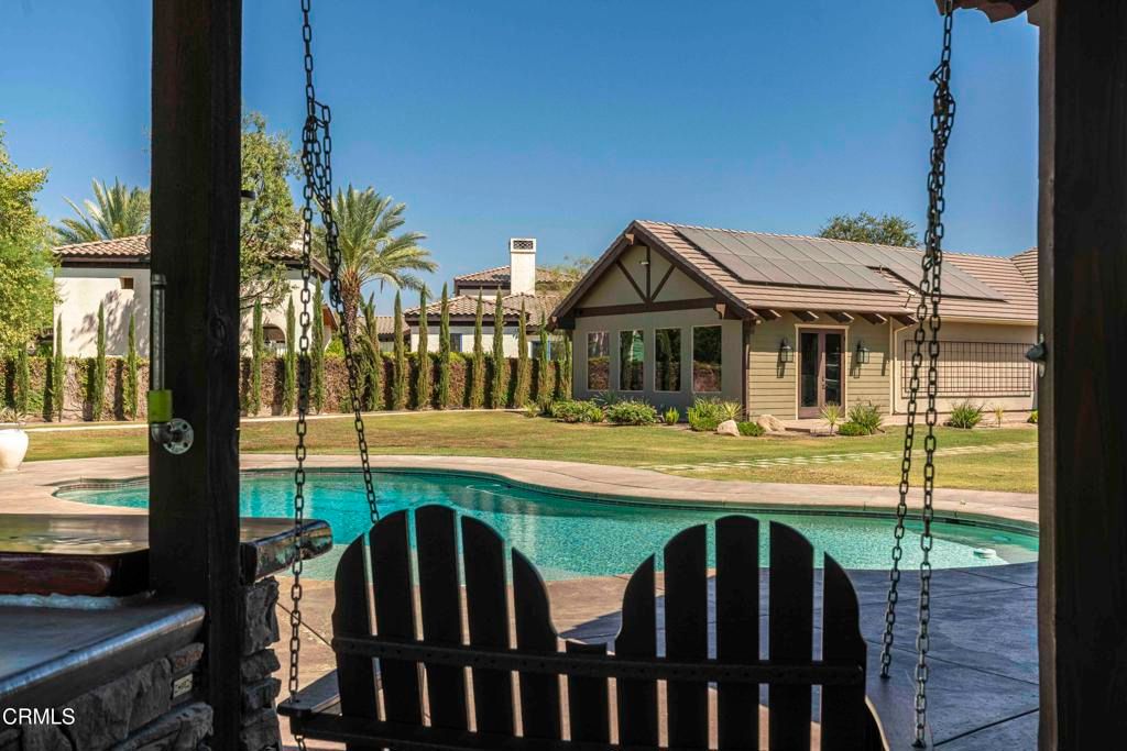 Exterior, Pool, Solar Panels