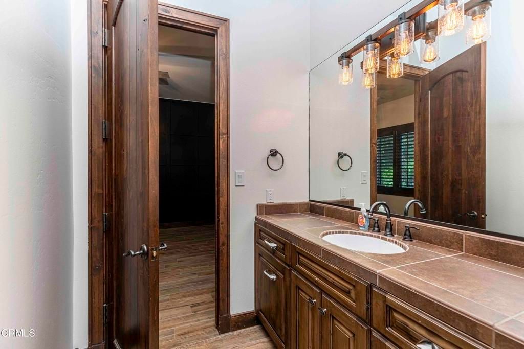 Bathroom, Dual Sink Vanities, Interior, Tile Countertops, Wood Texture Flooring