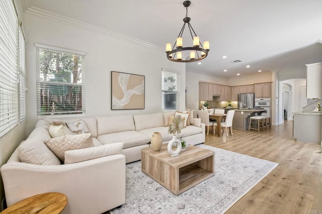 Chandelier, Dining room, Interior, Kitchen, Living room, Recessed Lighting, Stainless Steel Appliances, Wood Texture Flooring