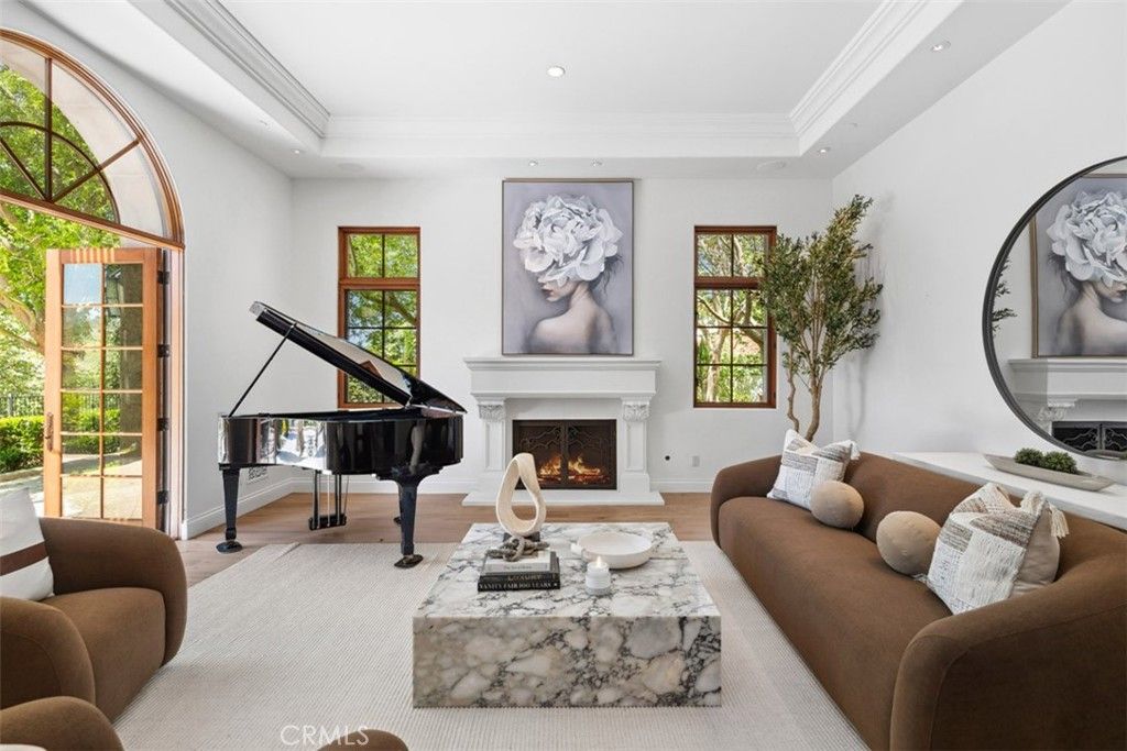 Fireplace, Interior, Living room, Piano, Recessed Lighting, Wood Texture Flooring