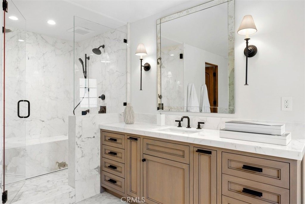 Bathroom, Dual Sink Vanities, Glass Shower, Interior, Marble, Marble Walls, Recessed Lighting