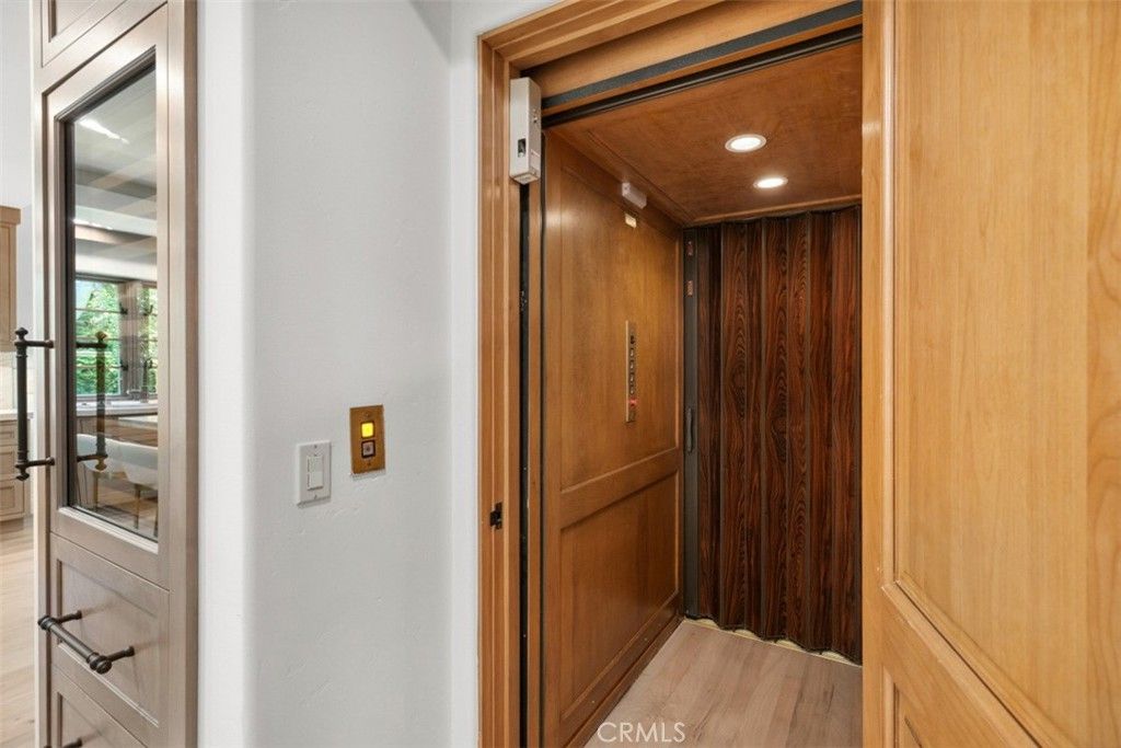 Elevator, Interior, Recessed Lighting, Wooden Ceilings, Wood Texture Flooring, Wooden Walls