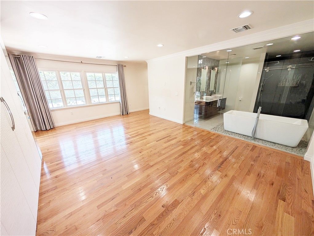 Bathroom, Empty room, Free Standing Baths, Glass Shower, Interior, Recessed Lighting, Wood Texture Flooring