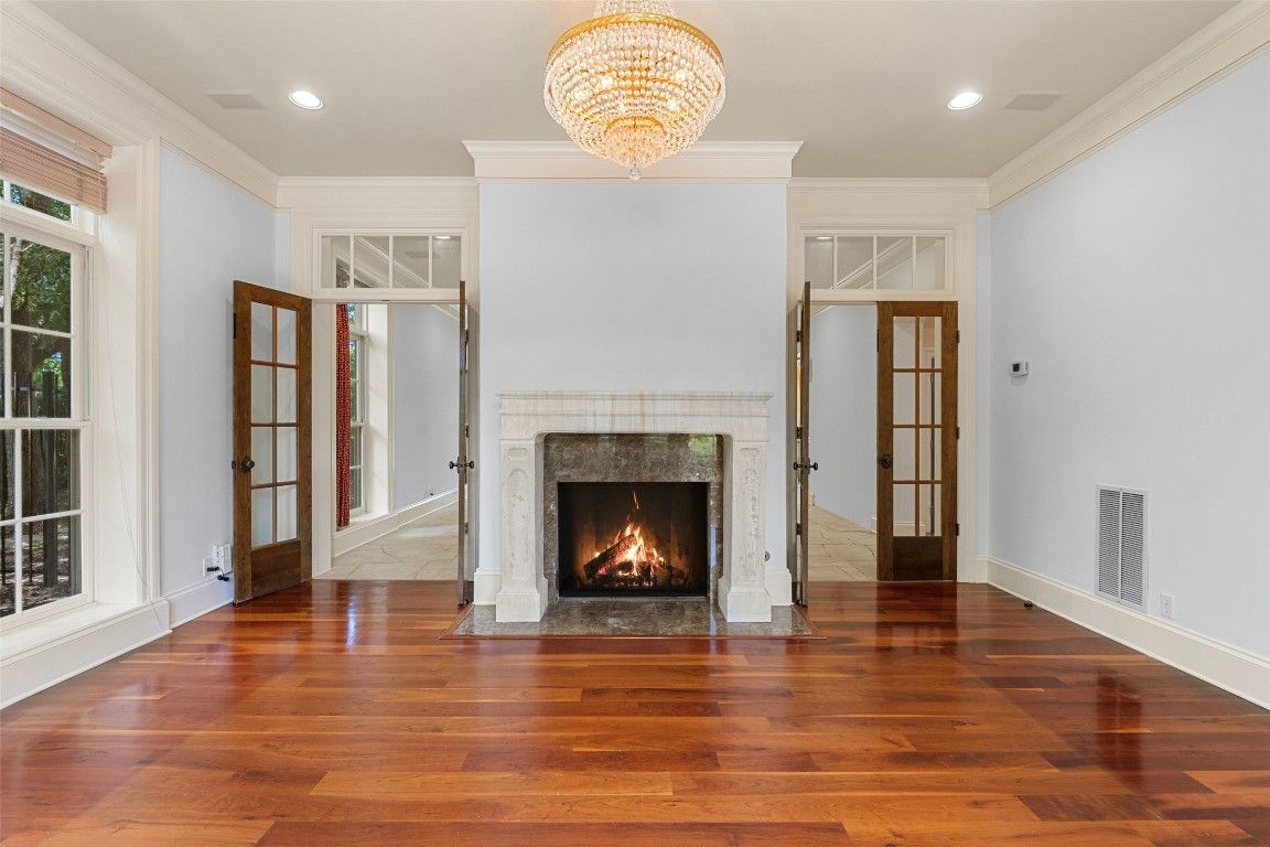 Chandelier, Empty room, Fireplace, Interior, Recessed Lighting, Wood Texture Flooring