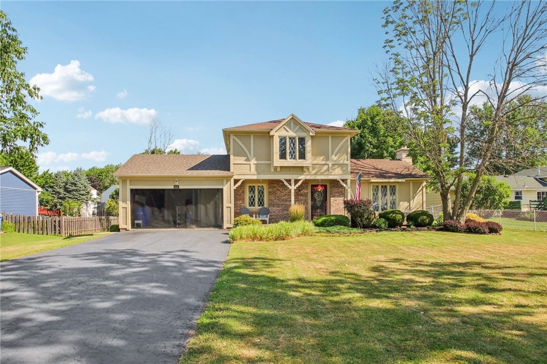 Attached, Backyard, Exterior, Facade, Brick Facade, Split Level