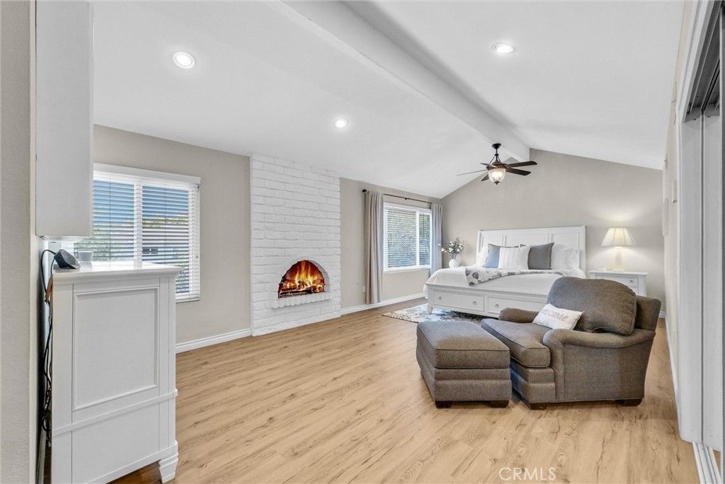 Bedroom, Fireplace, Interior, Recessed Lighting, Stone Walls, Wood Texture Flooring