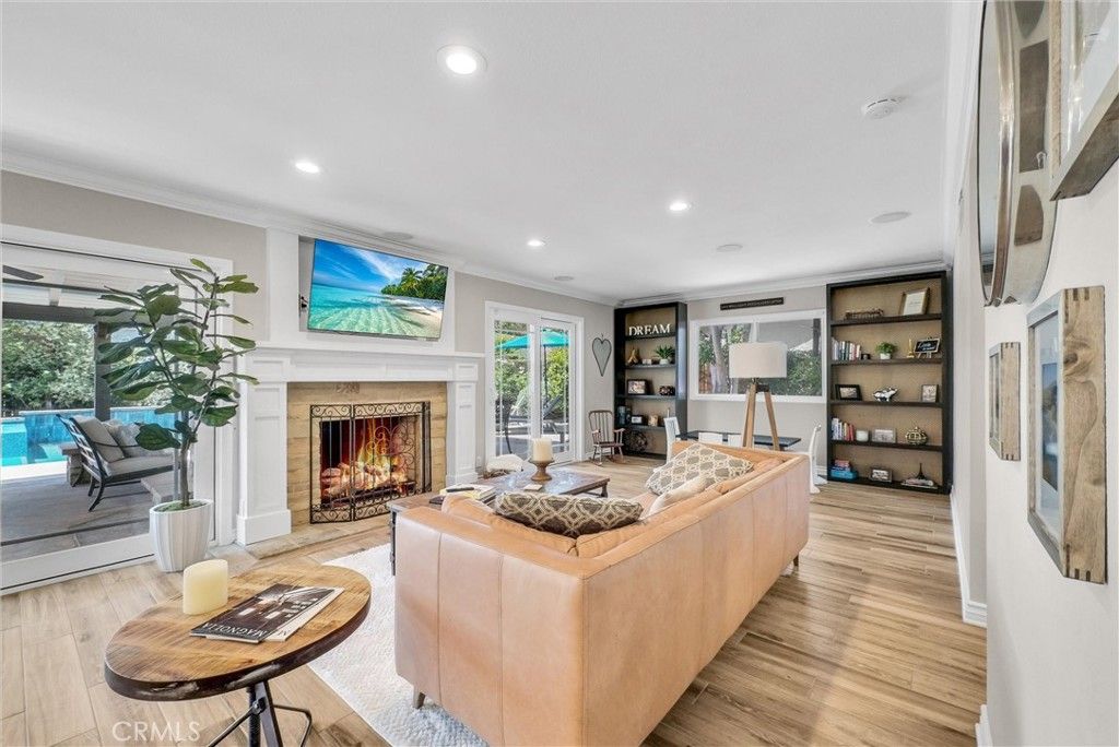 Fireplace, Interior, Living room, Recessed Lighting, Wood Texture Flooring