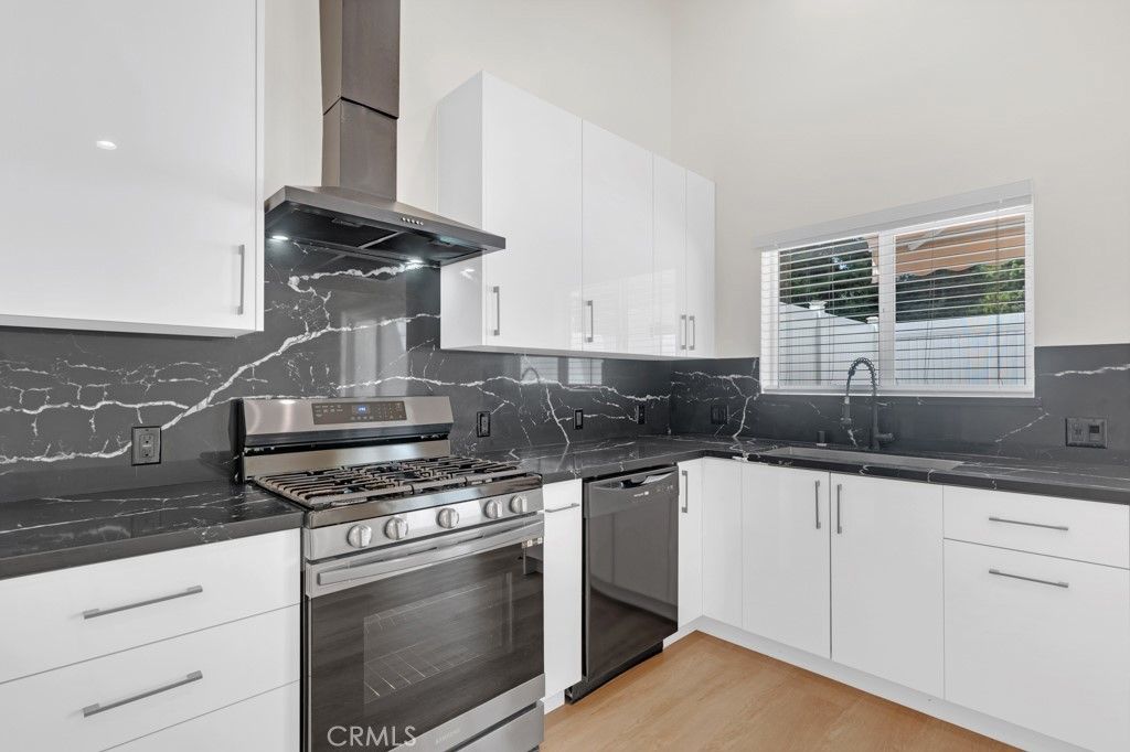 Interior, Kitchen, Marble Walls, Stainless Steel Appliances, Wood Texture Flooring