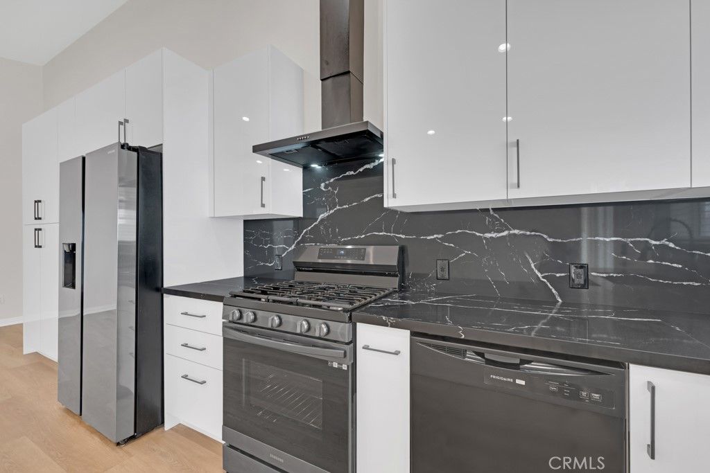 Interior, Kitchen, Marble Walls, Stainless Steel Appliances, Wood Texture Flooring