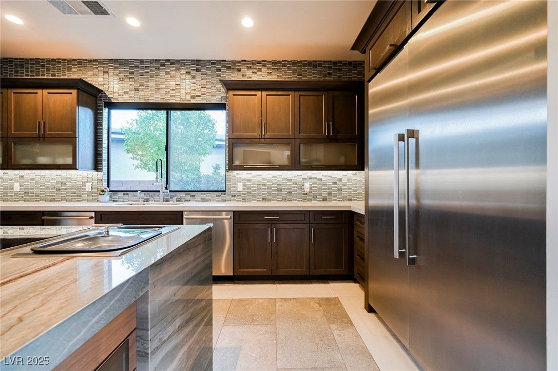 Interior, Kitchen, Recessed Lighting, Stainless Steel Appliances, Stone Walls