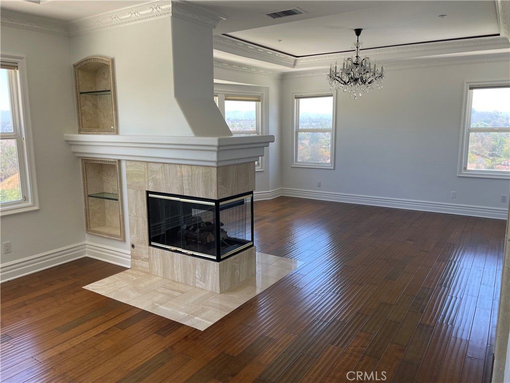 Chandelier, Empty room, Fireplace, Interior, Wood Texture Flooring