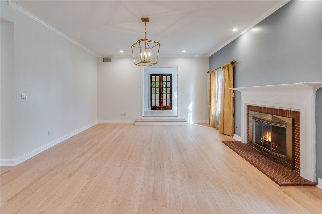 Empty room, Fireplace, Interior, Pendant Lights, Recessed Lighting, Wood Texture Flooring