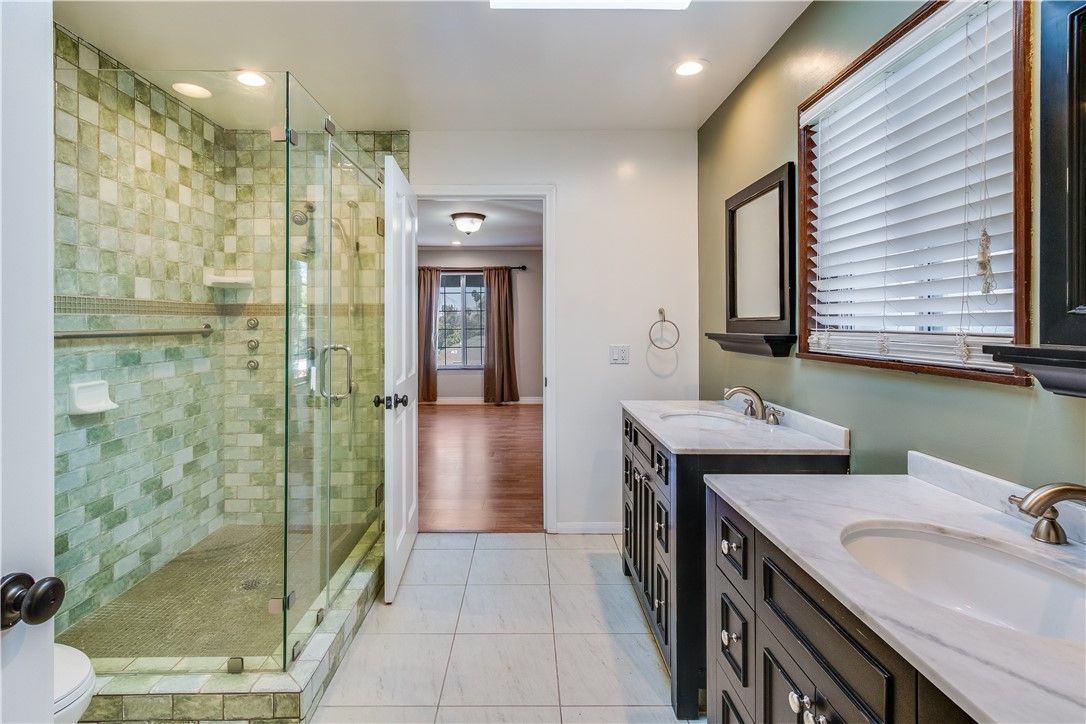 Bathroom, Dual Sink Vanities, Glass Shower, Interior, Recessed Lighting, Wood Texture Flooring