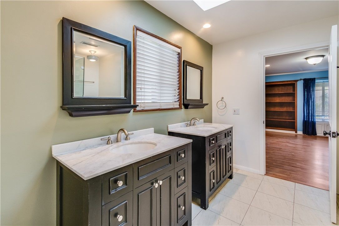 Bathroom, Dual Sink Vanities, Interior, Recessed Lighting, Wood Texture Flooring