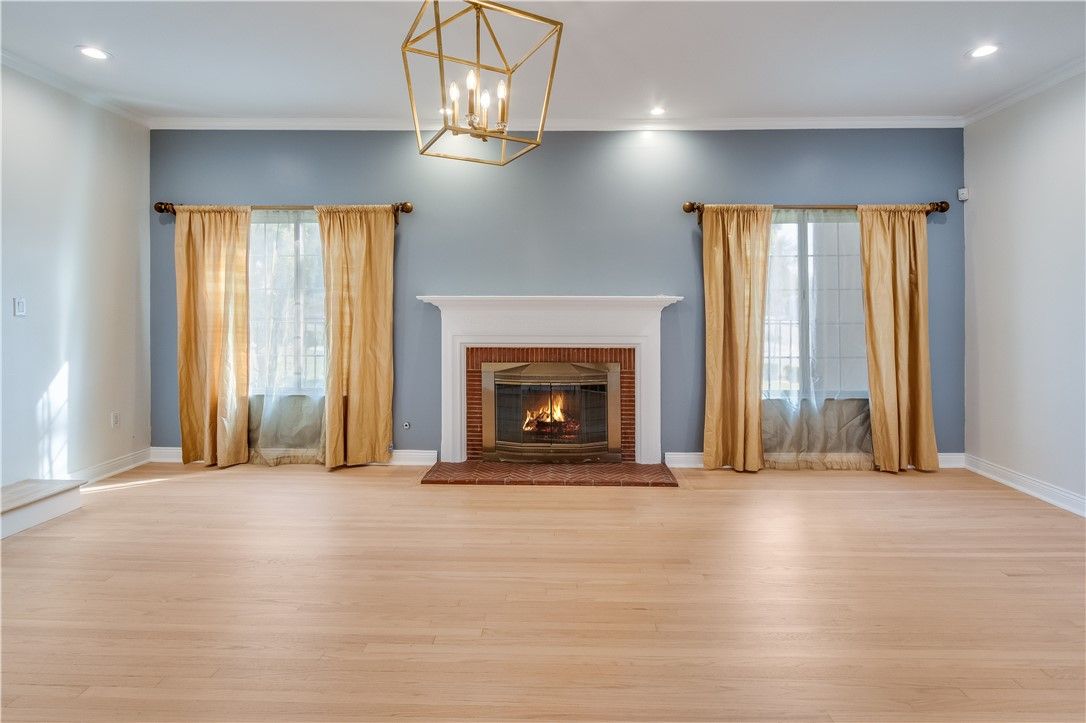 Empty room, Fireplace, Interior, Pendant Lights, Recessed Lighting, Wood Texture Flooring