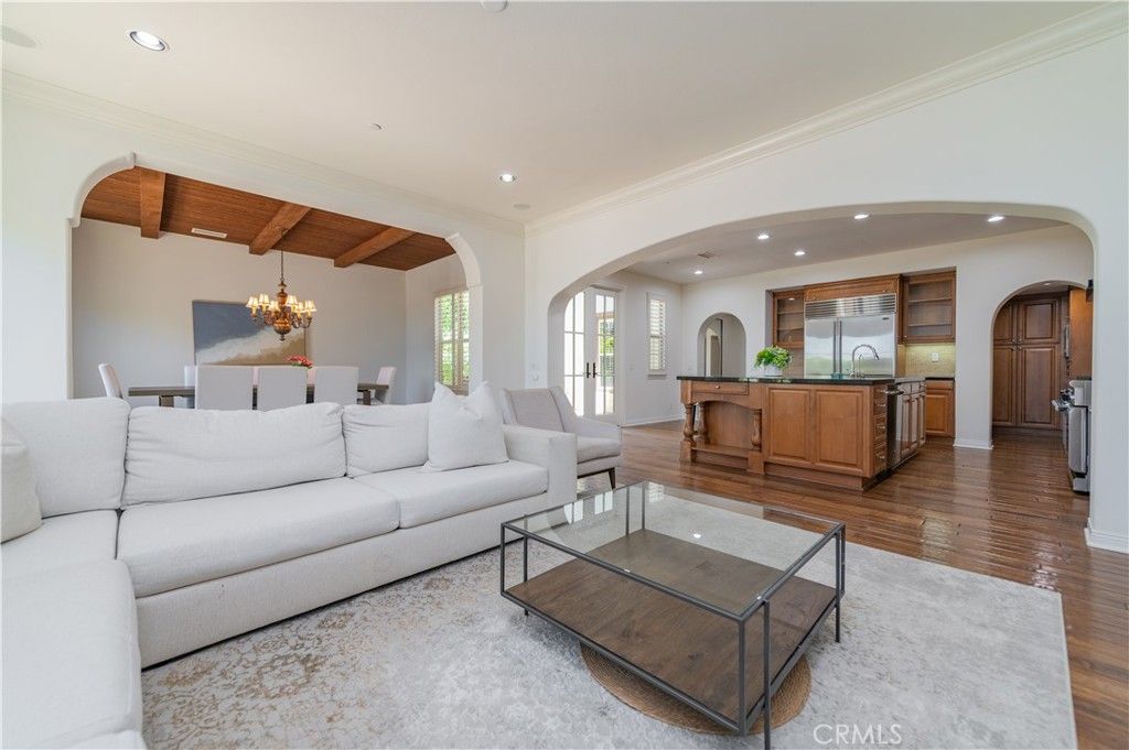 Chandelier, Dining room, Interior, Kitchen, Living room, Recessed Lighting, Stainless Steel Appliances, Wooden Beams, Wooden Ceilings, Wood Texture Flooring