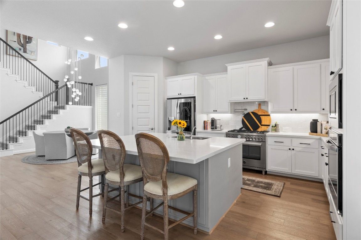 Interior, Kitchen, Pendant Lights, Recessed Lighting, Stainless Steel Appliances, Wood Texture Flooring