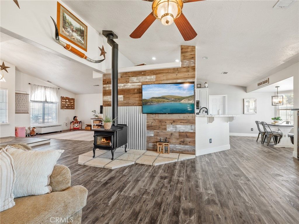 Dining room, Fireplace, Interior, Pendant Lights, Recessed Lighting, Wood Texture Flooring, Wooden Walls
