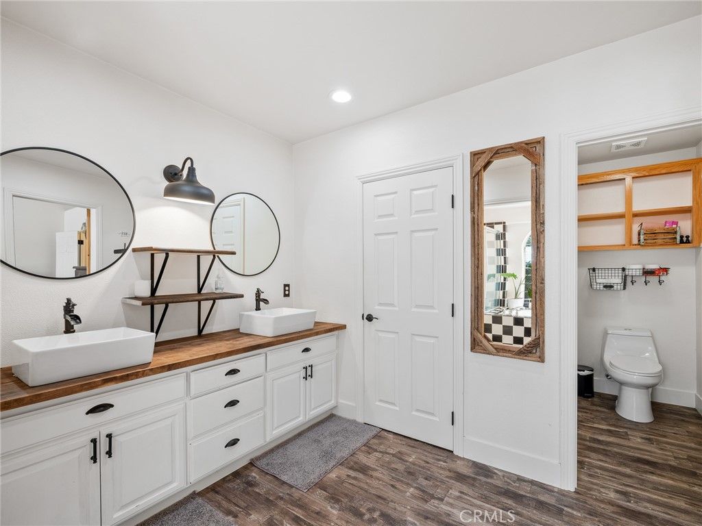 Bathroom, Dual Sink Vanities, Interior, Recessed Lighting, Wood Texture Flooring