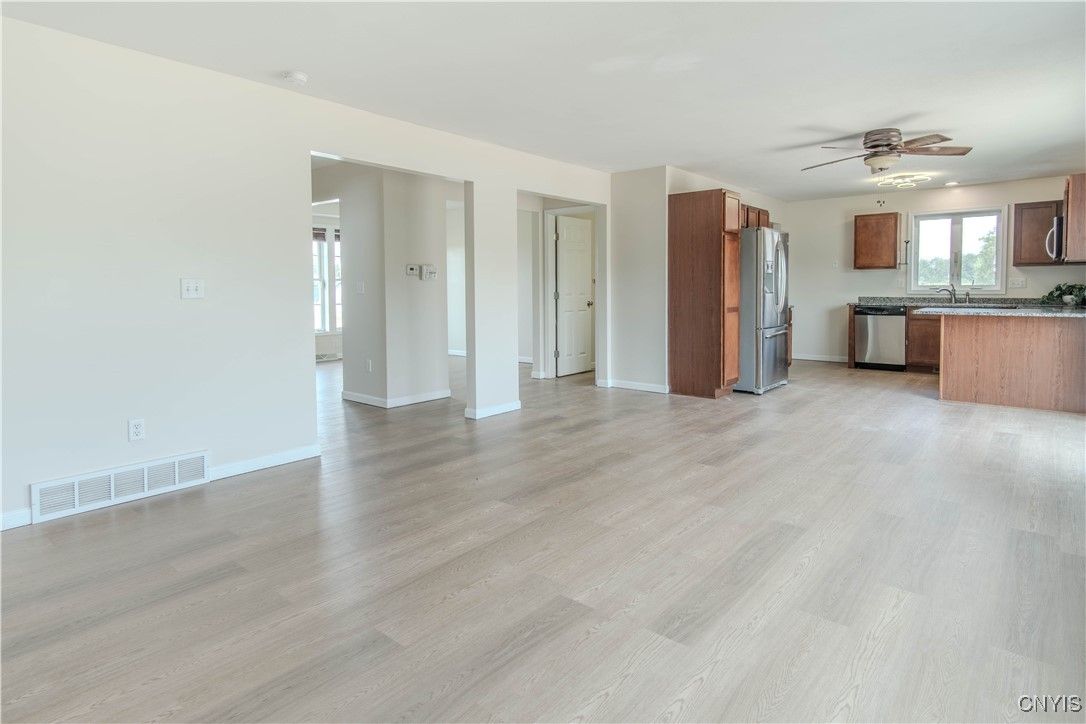 Empty room, Interior, Kitchen, Stainless Steel Appliances, Wood Texture Flooring