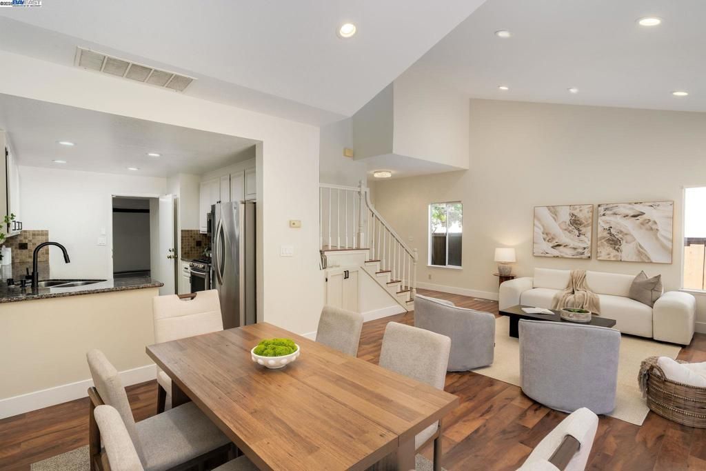 Dining room, Interior, Kitchen, Living room, Recessed Lighting, Stainless Steel Appliances, Wood Texture Flooring