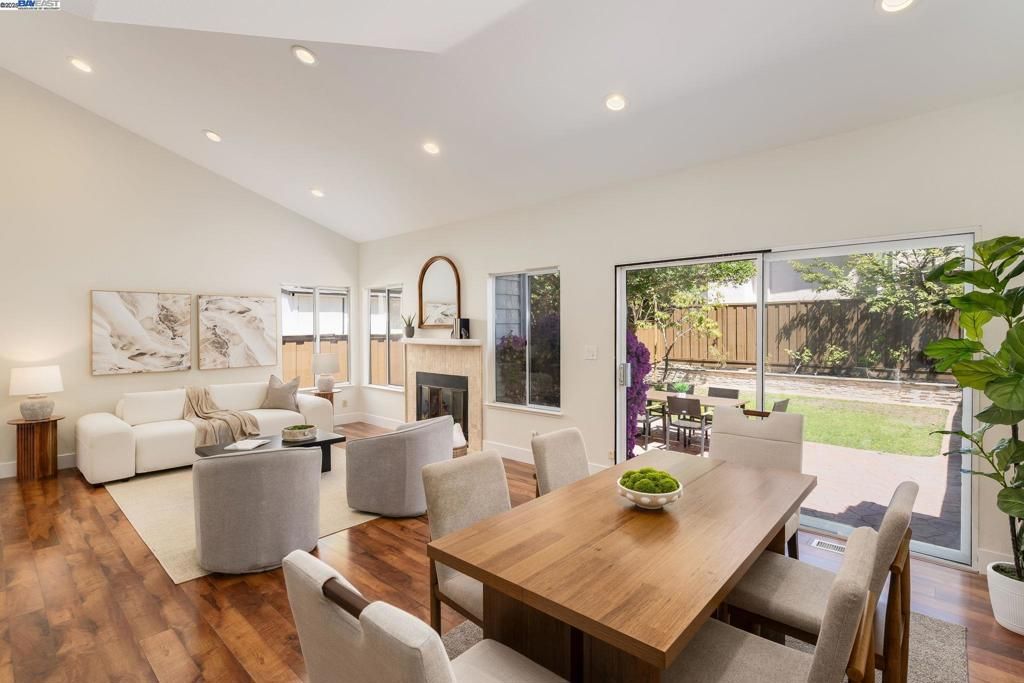 Dining room, Fireplace, Interior, Living room, Recessed Lighting, Wood Texture Flooring