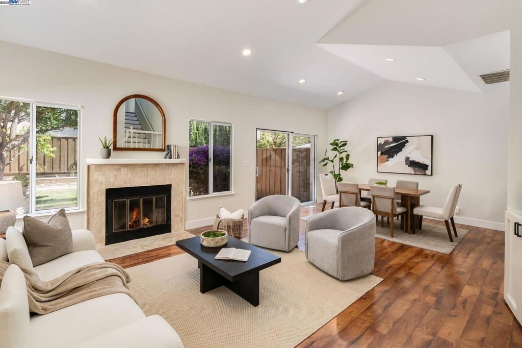 Dining room, Fireplace, Interior, Living room, Recessed Lighting, Wood Texture Flooring