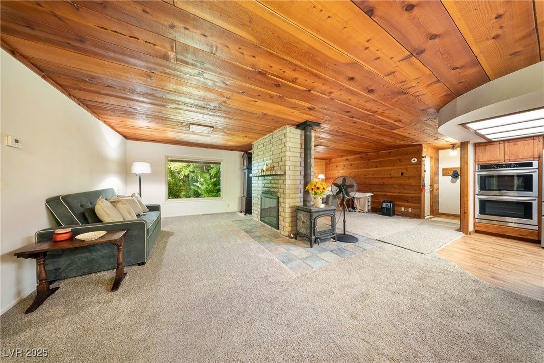 Fireplace, Interior, Kitchen, Stainless Steel Appliances, Stone Walls, Wooden Ceilings, Wood Texture Flooring, Wooden Walls