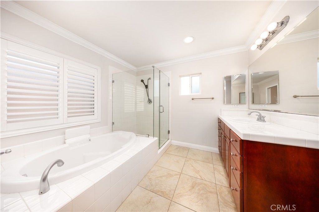 Bathroom, Dual Sink Vanities, Glass Shower, Interior, Recessed Lighting, Tile Countertops