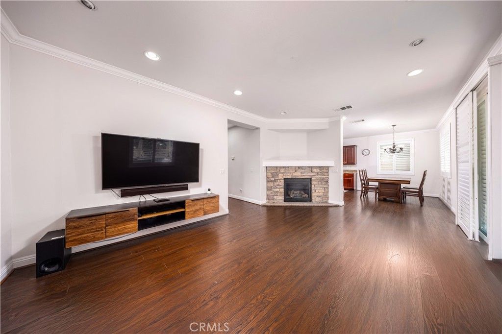 Dining room, Fireplace, Interior, Pendant Lights, Recessed Lighting, Wood Texture Flooring